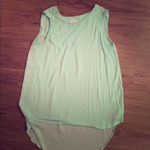Light turquoise blouse size medium no sleeves